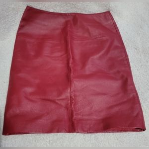 Genuine leather Red pencil skirt  with back slit Size 6. Prestine, worn once